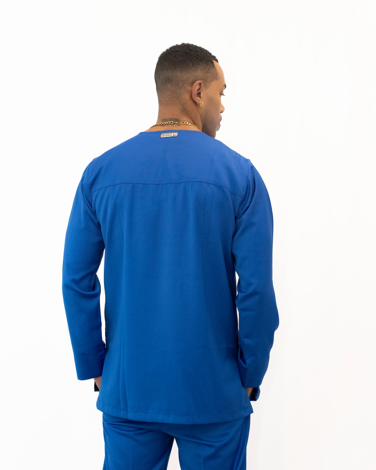 Ensemble Bleu à Manches Longues avec Détails en Pagne Africain