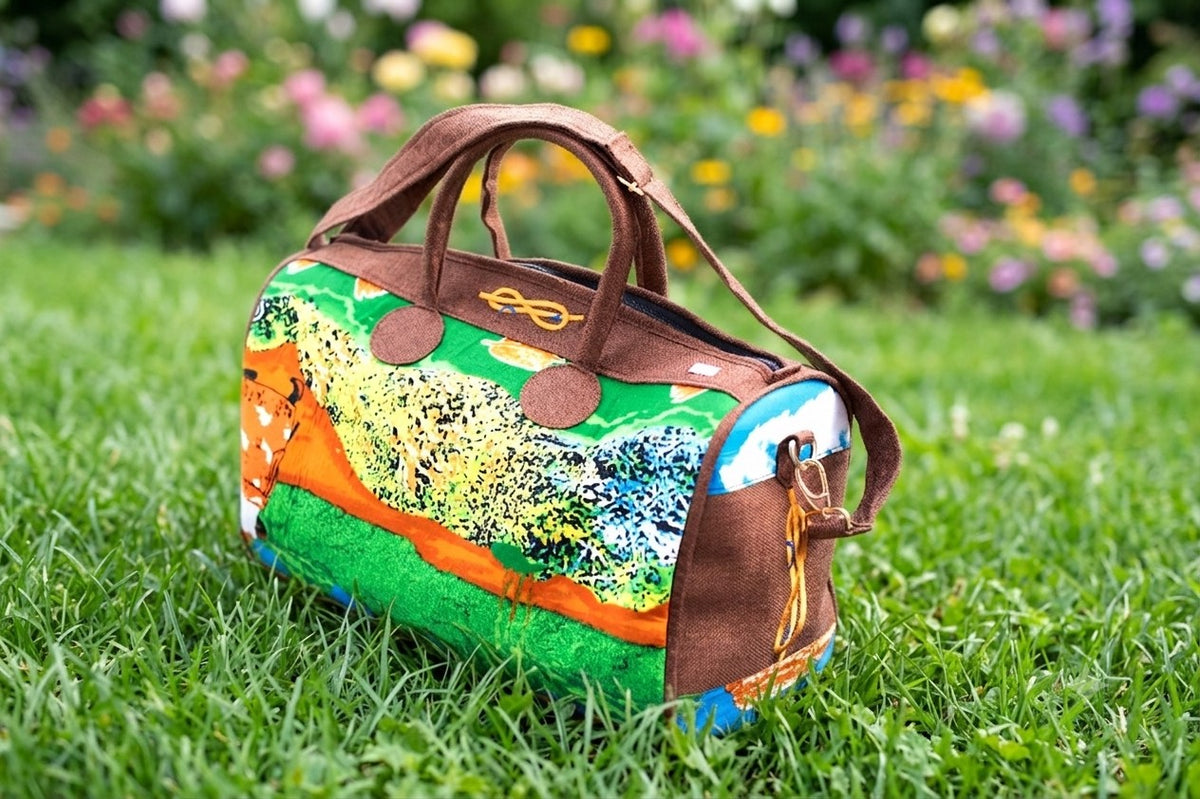 Sac de voyage artisanal "Mogavy". Toile de jute & imprimé évasion africaine.