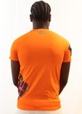 T-shirt orange customisé avec tissus et pagnes africains