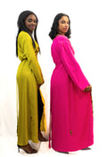 Robe caftan croisée verte avec touche de pagne africain
