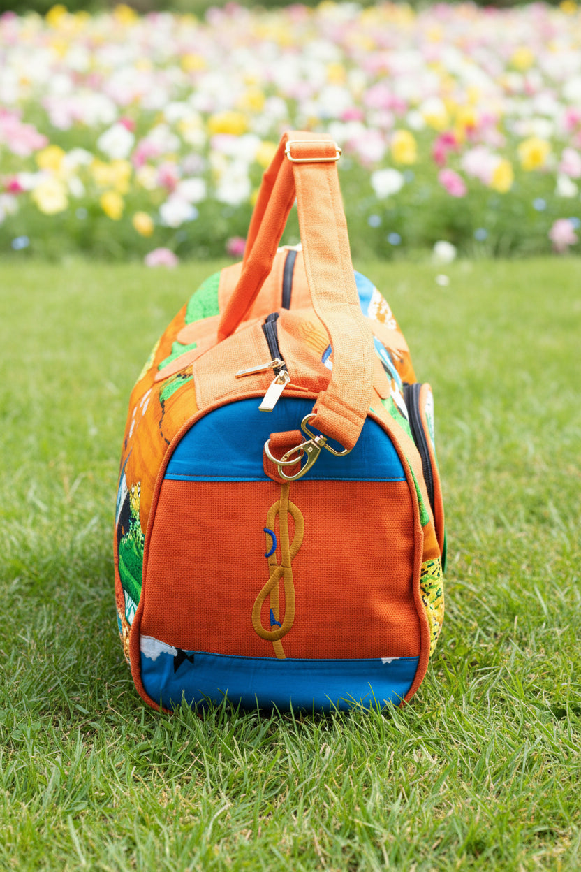 Sac de voyage polochon artisanal en toile de jute et pagne africain