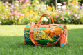 Sac de voyage polochon artisanal en toile de jute et pagne africain