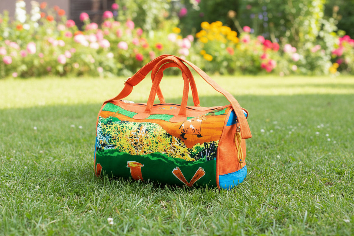 Sac de voyage polochon artisanal en toile de jute et pagne africain