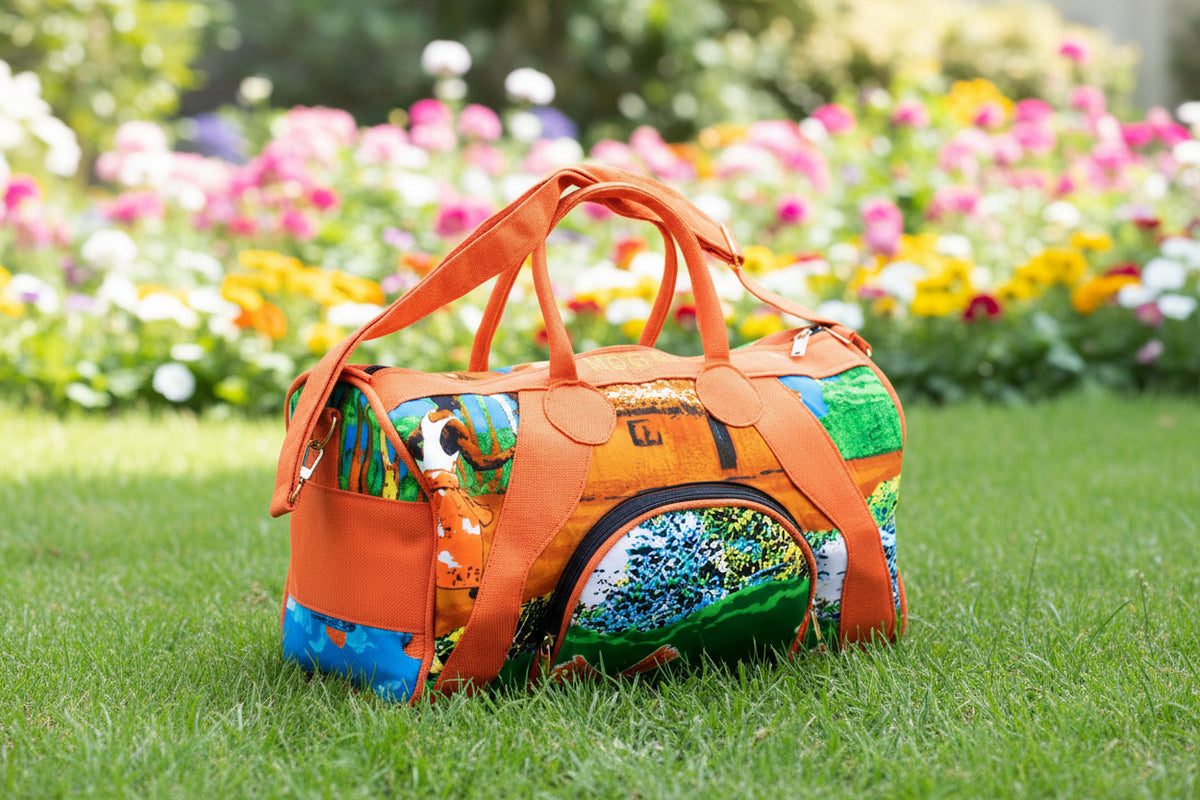 Sac de voyage polochon artisanal en toile de jute et pagne africain