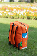 Sac à dos artisanal MOGAVY. Toile de jute orange et motifs paysages africains