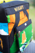 Sac à dos artisanal MOGAVY, Toile de jute noir et motifs paysages africains illustrés