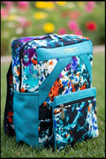 Sac à dos artisanal en toile de jute turquoise et motifs abstraits multi-couleurs
