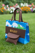 Sac cabas artisanal en toile de jute et tissu africain évasion, avec pochette.