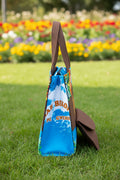 Sac cabas artisanal en toile de jute et tissu africain évasion, avec pochette.
