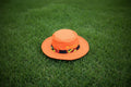 Le chapeau flamboyant. Orange mandarin & wax graphique