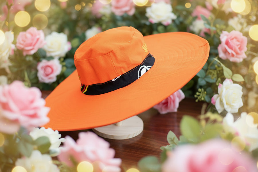Chapeau Capeline orange vitaminé & galon pagne camerounais
