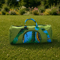 Sac de voyage et de sport vert en toile et wax fait main "Oasis Tropicale"